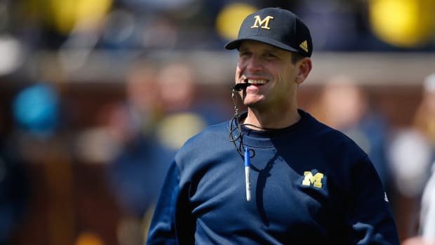 jim-harbaugh-nick-saban-satellite-camps-twitter.jpg